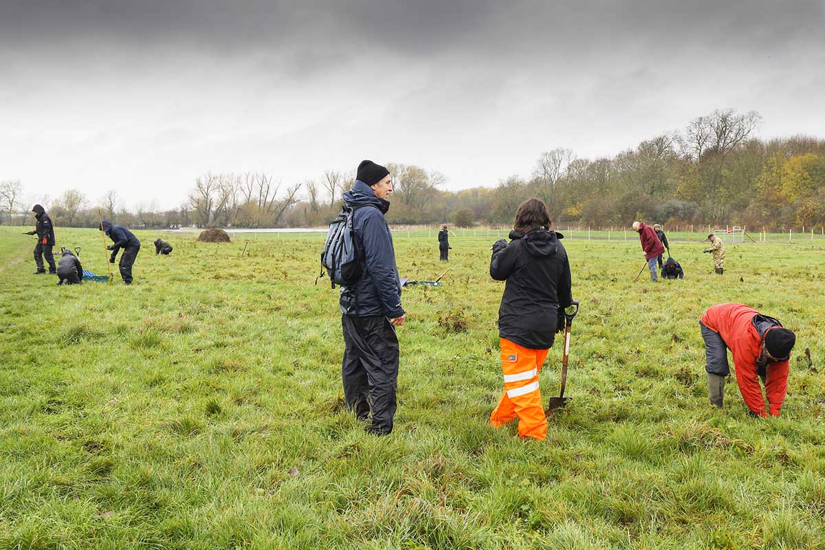 Photo of researchers in a field - copyright Mike Dodd