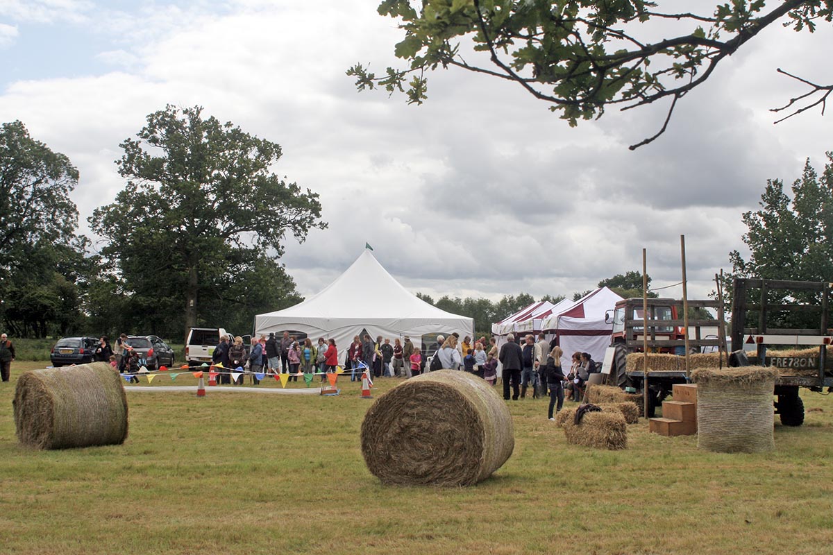 Photo of tents and hay bales at the Hay festival